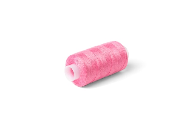 Pink threads on white background.