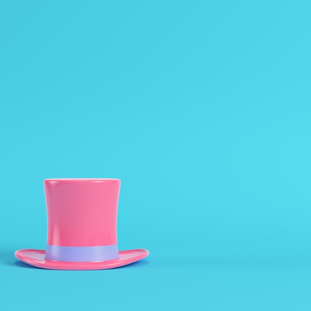 Pink top hat on bright blue background