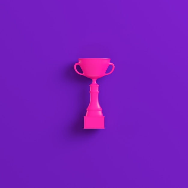 Pink trophy cup on violet 