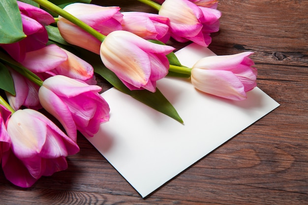 Pink tulips and card