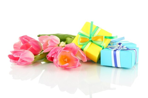 Pink tulips and gift boxes, isolated on white