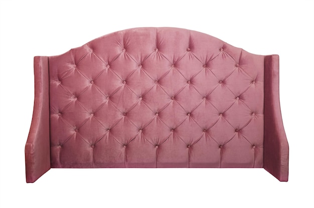 Pink velvet bed headboard isolated on white