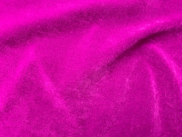 배경으로 사용되는 분홍색 벨벳 패브릭 질감 부드럽고 매끄러운 섬유 소재의 빈 분홍색 패브릭 배경 textx9를 위한 공간이 있습니다.