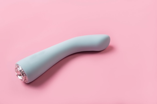 On a pink wall sex product, a toy for adults