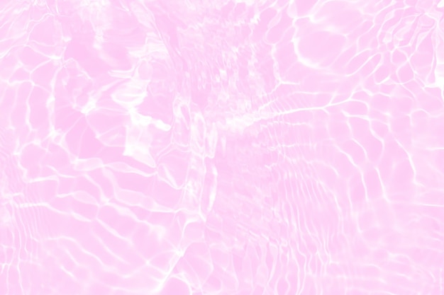 Pink water in a pool with light pink background