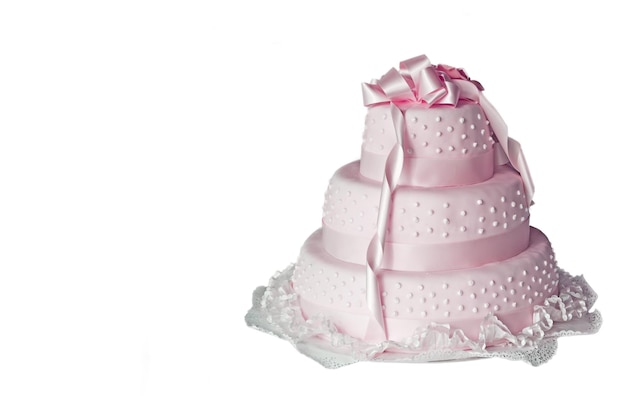 Pink wedding cake on white background