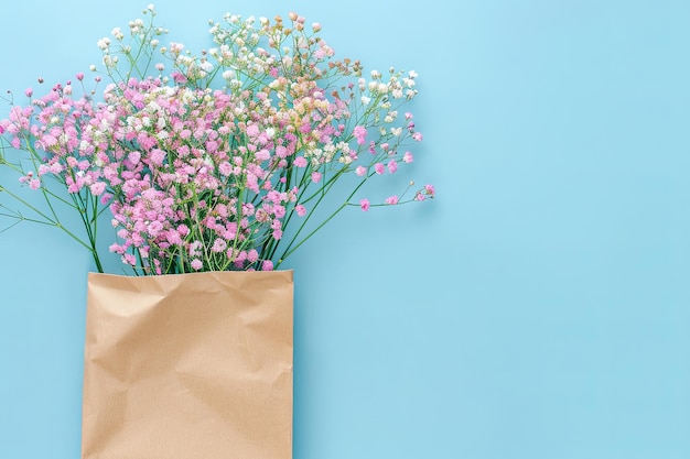 Pink and White Flowers in a Brown Paper Bag