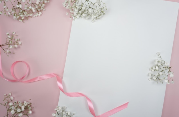 Pink and white flowers on a white background