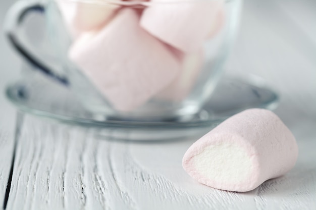 Pink and white marshmallow in glass