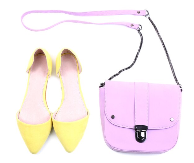 Фото Розовая женская сумка и цветная обувь, изолированные на ничуть