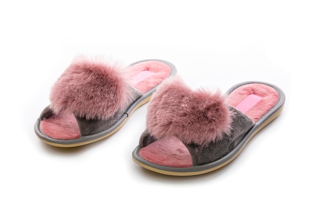 Pink women's slippers on a white background