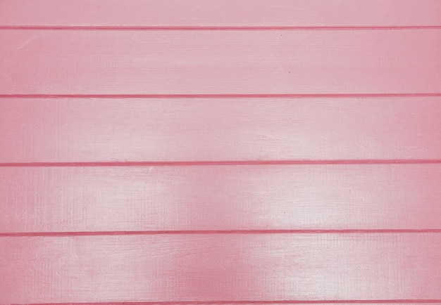 Photo pink wooden background