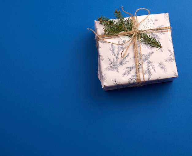 Pink wrapped gift boxes and tied with a brown rope