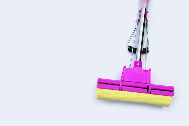 Pink yellow mop on white background