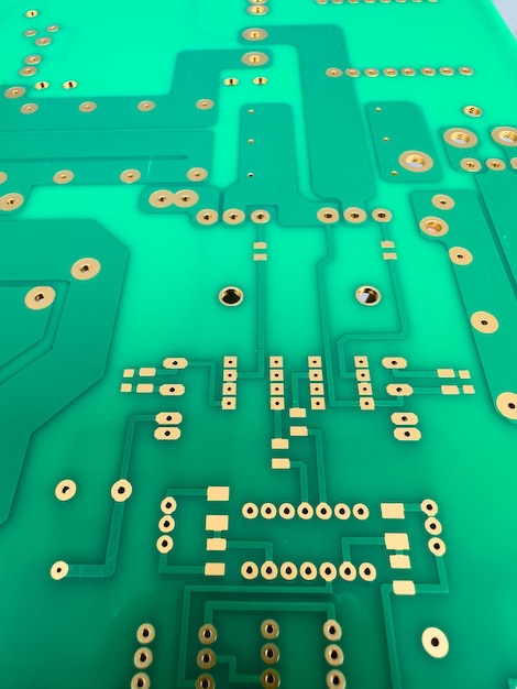 Pins and traces on the green PCB