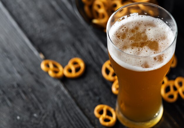 Pint of beer with pretzels