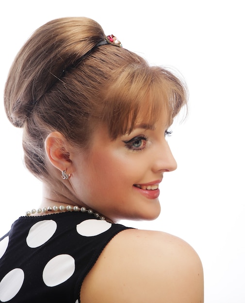 Pinup woman, style retro haircut, studio shot