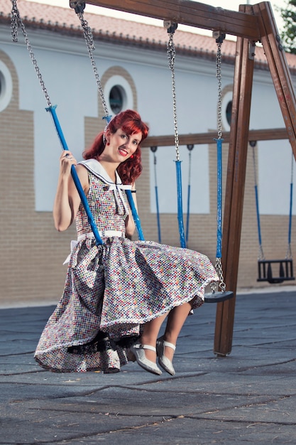 Pinup young woman in vintage style clothing