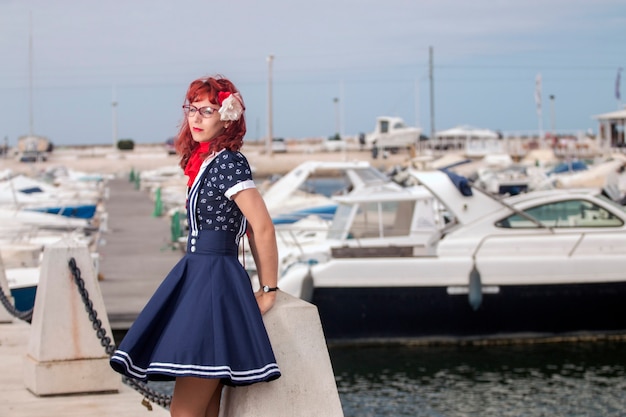 Pinup young woman in vintage style clothing