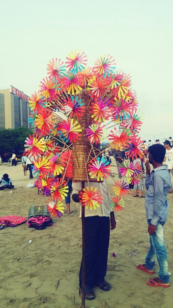 Photo pinwheel seller at beach