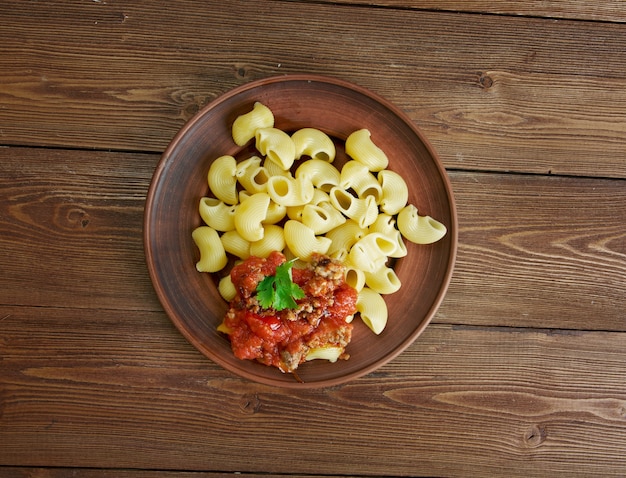 Pipe rigate pasta with meat sauces,