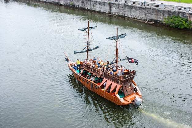 Pirate style ship setting sail on the high seas