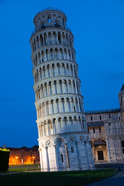 Pisa Italy 01 July 2023 leaning tower and cathedral panorama by night blue sky