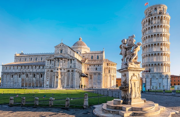 Pisa, Piazza dei miracoli, with the Basilica and the leaning tower with copy space. Tuscany, Italy