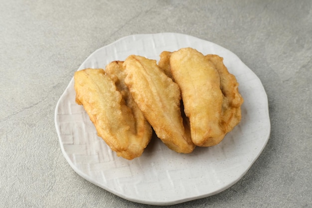 Pisang goreng or banana fritters deep fried banana fritter with flour batter selected focus