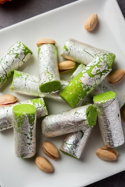 Pista Roll Or Pistachio Rolls Mithai or sigar Indian sweet or dessert for festivals