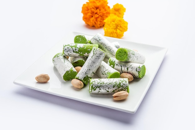 Pista Roll Or Pistachio Rolls Mithai or sigar Indian sweet or dessert for festivals