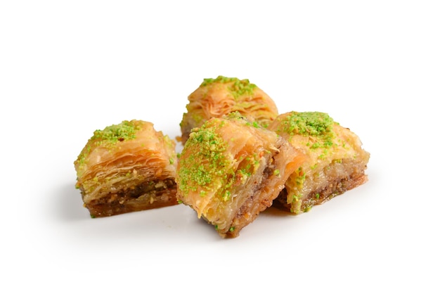 Pistachio baklava on a white background. Dessert.