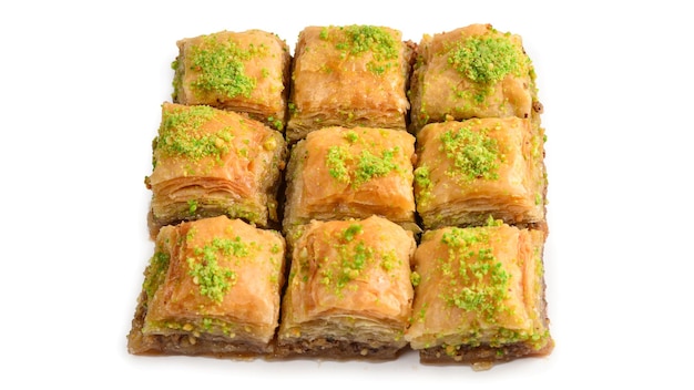 Pistachio baklava on a white background. Dessert.