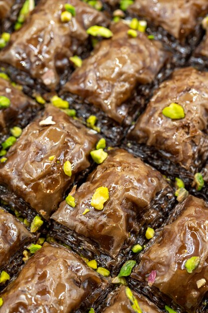 Pistachio chocolate baklava traditional middle eastern flavors\
local name cikolatali baklava close up