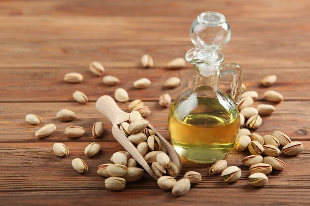 Pistachio oil on the table close up