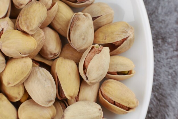 Pistachios are delicious nuts on a plate