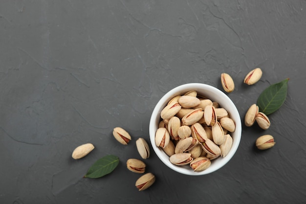 Pistachios closeup on the table on a light background