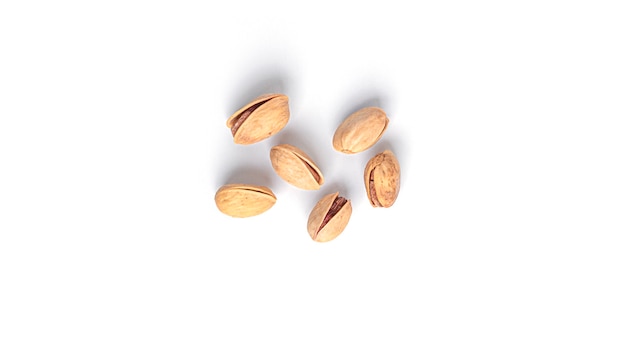 Pistachios isolated on white.