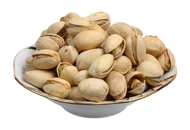 Pistachios on a plate isolated