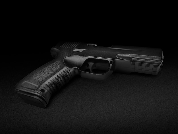 Pistol isolated on black background