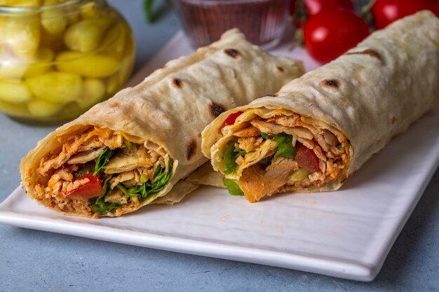 Pita bread lavash roll chicken doner kebab and fresh vegetables - Durum Chicken Doner Kebab