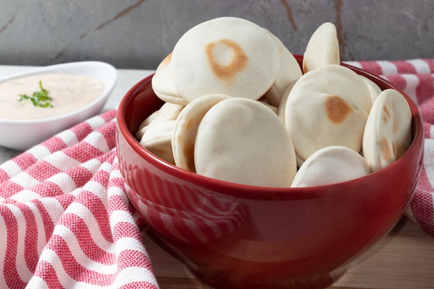 Pita bread with sauce composition.