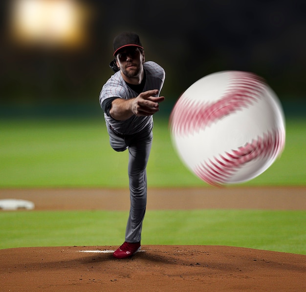 Pitcher  Player throwing a ball, on a baseball Stadium.