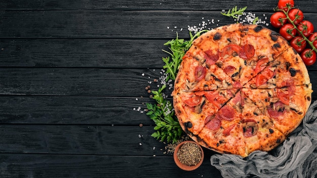 Pizza appetito Chicken fillet bacon paprika Top view On a wooden background Copy space