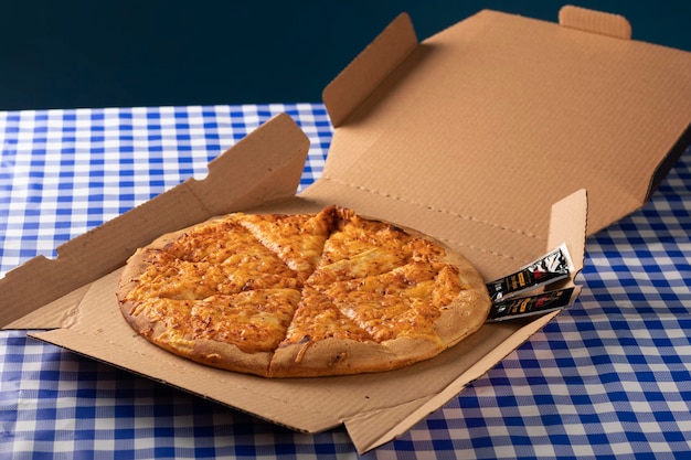 Pizza on a cardboard tray