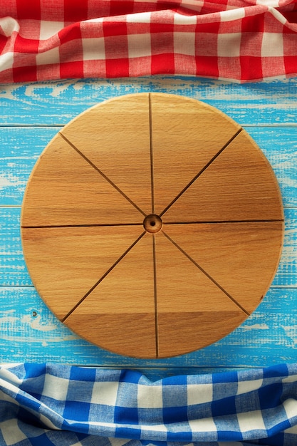 Pizza cutting board at wooden  