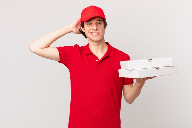 Pizza deliver man feeling stressed, anxious or scared, with hands on head