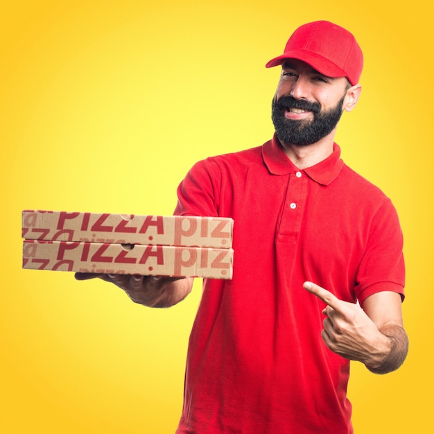 Photo pizza delivery man  on colorful background