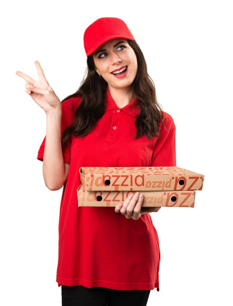 Pizza delivery woman making victory gesture