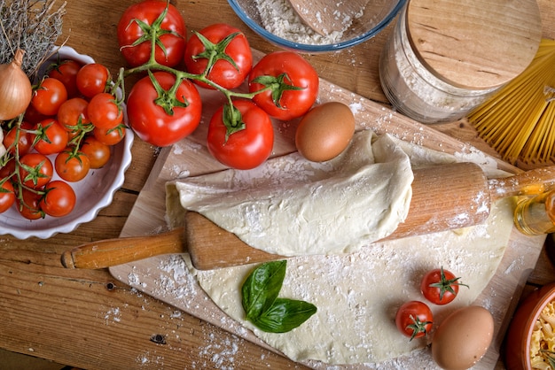 Pizza dough and ingredients